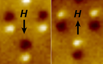 Magnetic microscope image of three nanomagnetic computer bits.
